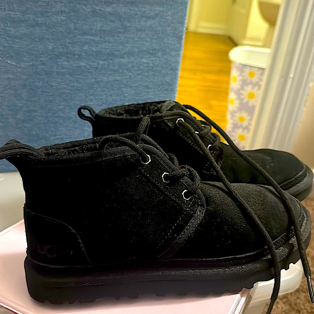 Women’s black, Ugg, lace up, boots.